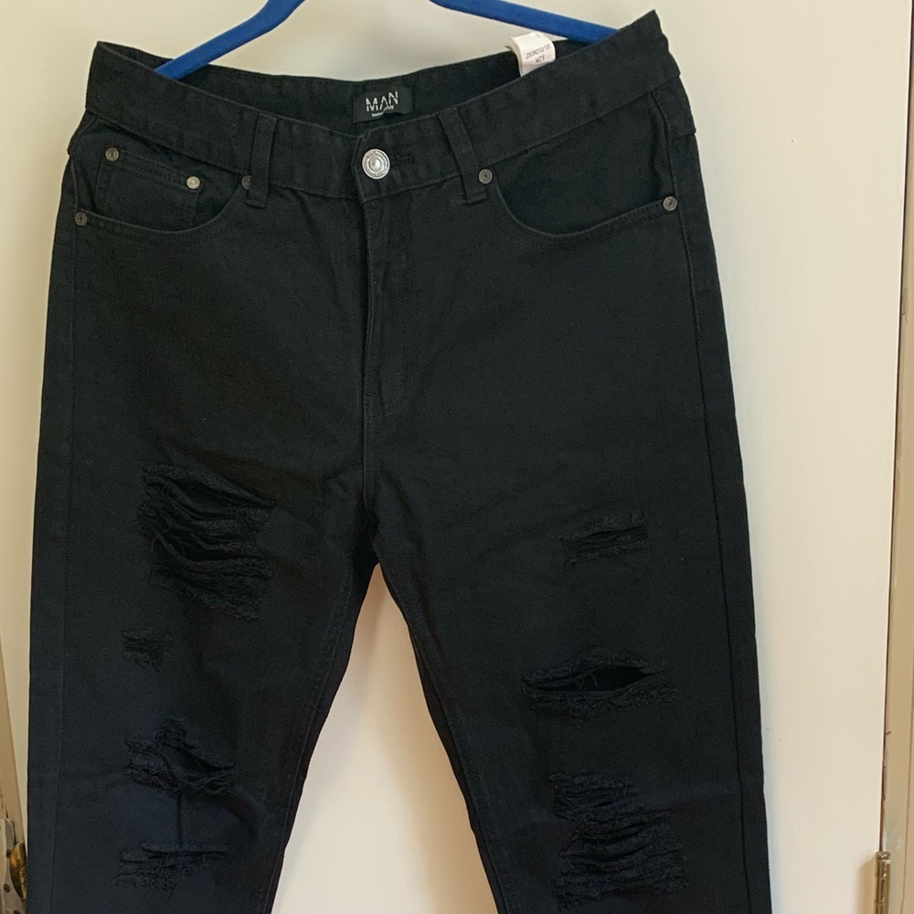 Men’s Skinny fit rigid jeans with extremes rips